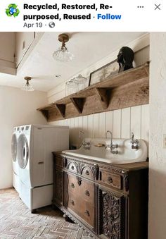 an old fashioned washer and dryer in a room with tile flooring on the walls