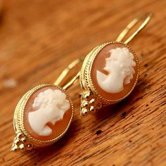 https://store.museumofjewelry.com/collections/cameo/products/rendezvous-earrings Roman Decor, Dr Jewelry, Ancient Roman Jewelry, Antique Urn, Roman Jewelry, Grey Moonstone, Replica Jewelry, Cameo Earrings, Neo Classical