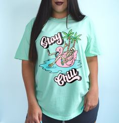 Stay chill shirt. *Colors shown are chalky mint and island reef. Model is a US size 6 wearing a size large for a baggy fit.* UNISEX SHIRT - 100% USA cotton - Pre-shrunk so no need to worry about shrinkage - Comfort Colors Brand - Heavyweight material for a more comfortable fit - Relaxed fit. Order a size up for a more baggy feel. Summer Skull Print Short Sleeve T-shirt, Fun Green T-shirt For The Beach, Casual Spring T-shirt With Skull Print, Relaxed Fit Palm Tree Print Tops For Spring, Spring Palm Tree Print Tops With Relaxed Fit, Casual Skull Print Summer T-shirt, Trendy Palm Tree Print Top For Vacation, Beach Skull Print Short Sleeve Top, Summer Skull Print Crew Neck Top