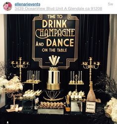 a table topped with lots of desserts and drinks next to a sign that reads time to drink champagne and dance on the table