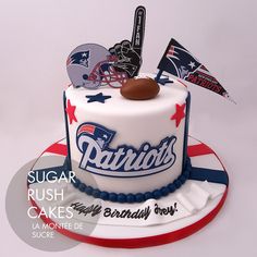 a cake that is decorated with some sports related items