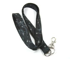 This cute lanyard has beautiful stars on black. It is perfect for any occasion. You can leave me a convoy if you need a different size. You can have a wardrobe of lanyard to match your outfit. This lanyard is made of soft 100% cotton fabric to give a comfortable feel around your neck. This lanyard is easy to take care. You can spot clean and throw in a washer and hang dry. If you want you can iron and it is ready to use. These lanyards are perfect if you have metal allergy. Each of these lanyard Adjustable Black Lanyards For Personal Use, Black Lanyard With Key Leash As Gift, Black Lanyard With Key Leash For Personal Use, Adjustable Black Badge Holder With Key Leash, Cute Lanyard, Beautiful Stars, Stars Fabric, Cute Lanyards, Star Badge