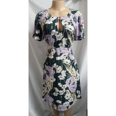 Ann Taylor $119.99 Color: Deep Green, Lilac, Off White, Tan. Floral Print Scoop Neckline. Small Keyhole At Bust With Button Closure. Waistline. Flare Short Sleeves. Princess Seams At Bodice. A Line Skirt. Back Zipper, Hook & Eye Closure. Lined Bodice. Approximate Measurements Are Taken On A Flat Surface: Bust: Under To Underarm 18" Waist: 15 1/2" Length: Shoulder To Hem 36" Material: 100% Viscose Lining: 100% Polyester. Machine Wash Cold. Condition: New With Tags. Purple Floral Print Knee-length Mini Dress, Elegant Purple Floral Print Mini Dress, Purple A-line Midi Dress With Floral Print, Purple Floral Print Knee-length Midi Dress, Spring Purple Lined Midi Dress, Purple Floral Print A-line Midi Dress, Purple Floral Print Short Sleeve Midi Dress, Knee Length Dresses Casual, Vintage Print Dress