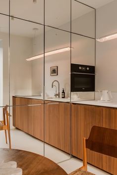 the kitchen is clean and ready to be used as a dining room or office space