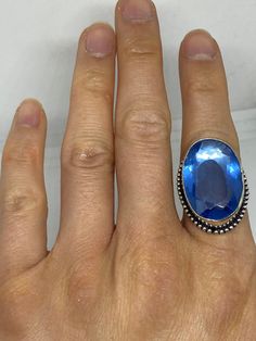 Large brilliant Blue antique glass Ornate German Silver Vintage ring, does not tarnish Size 9 can be adjusted by my jeweler. He charges $10-$20 All rings are shipped in a nice gift box. Check out our over a THOUSAND great reviews Engraving is $4 per letter and is not always perfect depending on the piece. It can take a few days if the jeweler is busy. This is payable to Paypal Judithsltd@gmail.com Blue Cabochon Topaz Ring Gift, Blue Cabochon Topaz Ring For Gift, Adjustable Blue Topaz Gemstone Ring, Unique Blue Cabochon Moonstone Ring, Unique Blue Moonstone Ring, Unique Blue Moonstone Cabochon Ring, Unique Blue Crystal Round Ring, Unique Blue Crystal Promise Ring, Blue Cabochon Topaz Ring For Anniversary