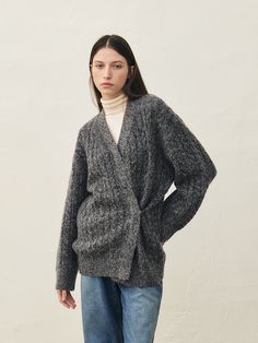 Editor's NotesRTF Cable Wrap Knit Cardigan is oversized fit cable knit cardigan that can be closed with a hidden button in the center.- Wearable in wrap style with side buttons- Overfit style You can style and various products with various clothes- The neckline and body hem sleeves are finished with a ribbedMeasurements(in.)Size: S, M- Shoulder: 22 in. / 22.4 in. - Chest: 23 in. / 23.4 in. - Hem opening: 18.1 in. / 18.9 in. - Sleeve Length: 20 in. / 20.5 in. - Length: 27 in. / 28 in.*Model info: V-neck Cable Knit Outerwear For Layering, Oversized Cable Knit Sweater For Work, Relaxed Fit Cable Knit Cardigan For Layering, Oversized Cable Knit Cardigan For Work, Cable Knit V-neck Outerwear For Layering, Cozy Cable Knit Sweater Coat For Work, Cable Knit Cardigan For Workwear, Workwear Cable Knit Cardigan, Cable Knit Cardigan