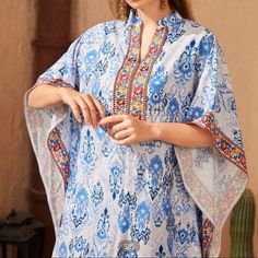 Floral Embroidery Beautiful Kaftan Dress Shoulder 15.6 Inches Length 55.3 Inches Sleeve Length 15.9 Inches Bust 46.5 Inches Waist 47.6 Inches Hip 49.6 Inches Brand New Only Tag Is Opened. Festive Printed Dresses For Vacation, Festive Vacation Dresses With Printed Motifs, Bohemian Blue Kaftan With Printed Motifs, Bohemian Blue Printed Kaftan, Blue Summer Kaftan With Printed Motifs, Blue Printed Kaftan For Summer, Blue Kaftan With Printed Motifs For Summer, Summer V-neck Kaftan With Printed Motifs, Summer V-neck Printed Kaftan