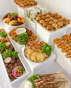 a table topped with lots of different types of food