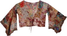 Exotic and one of a kind, this crop top is a unique one with its bell sleeves, printed patchwork, front tie and the choco brown sprinkling.  The patchwork has varied floral and geometric random patterns - each piece is unique. #tlb #Patchwork #vacationclothing #beachwrap #Floral #Printed #Paisley #bohemianfashion #70sfashion #70shippietop Hippie Brown Long Sleeve Tops, Fitted Bohemian Brown Crop Top, Bohemian Cotton Tops With Mixed Print, Bohemian Cotton Mixed Print Tops, Fitted Multicolor Floral Patchwork Tops, Fitted Long Sleeve Tops With Floral Patchwork, Bohemian Brown Crop Top, Fitted Brown Patchwork Top, Bohemian Brown Cotton Crop Top