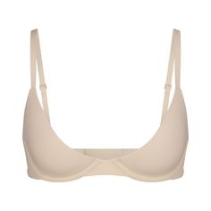 This lightly lined, buttery-soft scoop bra is engineered for an ultra-comfortable, barely-there fit with innovative cup technology to fit in between sizes. Features flexible, supportive underwire, adjustable straps, and hook and eye back closure. Fits true to your SKIMS bra size. | SKIMS Plunge Bra | Light Neutral | 32C | Fits Everybody 30d Bra, Mesh Bras, Comfy Lounge Wear, Mesh Bra, Plunge Bra, Good American, Designer Wear, Life Size, Modern Fashion