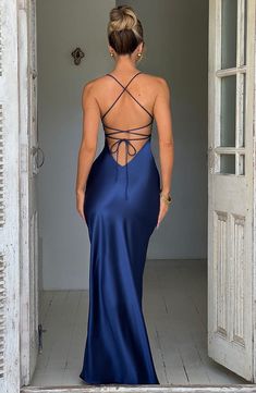 If you are looking for a super soft, romantic silhouette that skims over the body and enhances your figure, meet the Isobel maxi. Made from our silky soft satin with a bias cut, Isobel features a plunge neck, super low back with tie straps and a thigh high split. 



Colour: Navy.

Non stretch bias cut satin.

Thigh high split.

Plunge v-neck.

Hugs the figure.

Super low back with tie straps.

Maxi length.

Model is an XS and is wearing an XS.

 Size: XS, S, M, L, XL, XXL Silk Prom Dress Satin Open Backs, School Ball Dresses, Prom Dresses Navy, Satin Blue Dress, Prom Dress Navy, Homecoming Dresses Corset, Tiana Dress, Midi Dress Wedding Guest, Low Back Dress