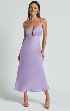 Turn heads in the stunning Amitola Midi Dress - V Neck Cut Out Slip Dress In Lilac. This mesmerizing cocktail dress is perfect for any special occasion, with its deep plunge neckline and sleeveless design that exudes confidence and femininity. Crafted from luxurious satin polyester fabric, this purple beauty offers a flawless fit and a touch of glamour to make you feel like the belle of the ball. Whether you're attending a wedding or hitting the dance floor, this maxi dress will have you feeling Spring Gala V-neck Slip Dress, Purple Satin V-neck Slip Dress, Elegant Purple V-neck Party Dress, Purple Sleeveless Midi Dress For Gala, Sleeveless Purple Midi Dress For Gala, Purple Midi Dress With Sweetheart Neckline For Party, Purple Sweetheart Neckline Midi Dress For Party, Glamorous V-neck Slip Dress For Cocktail, Glamorous V-neck Cocktail Slip Dress