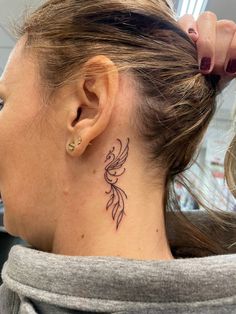 Crazy Tattoos For Women, Small Phoenix Tattoos Behind Ear, Phoenix Ear Tattoo, Pheonix Tattoo Behind The Ear, Phenix Tattoo For Women Simple, Phoenix Tattoo Back Of Neck, Behind The Ear Phoenix Tattoo, Phoenix Tattoo Behind Ear, Phoenix Rising Tattoo For Women