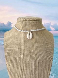 White seed bead necklace with sea shell charm necklace: 14” extender: 2.75” White Seed Bead Necklace, Diy Necklace Designs, Simple Choker Necklace, Staple Necklace, Shell Charm Necklace, Seed Bead Choker, Gold Locket Necklace, Cross Choker, Bracelet Craft Diy