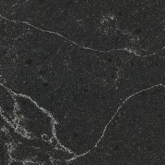 black marble with white swirls on it