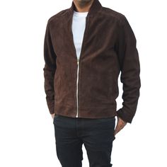 Crafted from genuine goatskin leather, this jacket offers both durability and style. The quilted polyester lining ensures warmth and comfort, while the zipper closure adds a sleek touch. Featuring a knit rib collar and snap button cuffs, this brown sueude jacket embodies a perfect blend of functionality and fashion. Ideal for any season, its timeless design makes it a versatile addition to your wardrobe. Classic Biker Jacket With Ribbed Cuffs For Fall, Classic Fall Biker Jacket With Ribbed Cuffs, Brown Leather Jacket With Ribbed Cuffs, Leather Outerwear With Ribbed Collar For Fall, Brown Outerwear With Ykk Zipper For Fall, Fitted Brown Outerwear With Ribbed Collar, Classic Leather Jacket With Ribbed Collar, Classic Leather Jacket With Ribbed Collar For Fall, Leather Jacket Mens