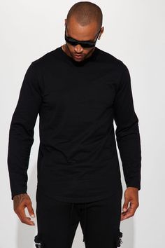 Model Height: 6'2 - Wearing Large Big & Tall: Height 6'3- Wearing XXXL Available In Black, Burgundy, Grey, Navy, Olive And White T-Shirt Crew Neck Long Sleeve 100% Cotton Imported | Mens Essential Long Sleeve Scallop Tee Shirt in Black size Small by Fashion Nova Black Longsleeves Outfit Men, Urban Black Long Sleeve Shirt, Men’s Black Long Sleeve Outfit, Black Midweight Long Sleeve Hoodie, Faux Leather Puffer Vest, Leather Puffer Vest, Functional Black Long Sleeve T-shirt, Red Puffer Vest, Leather Puffer