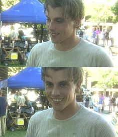 two pictures of a young man smiling at the same time as he stands in front of blue tents