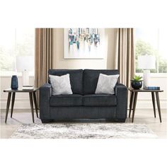 a living room scene with focus on the sofa