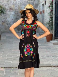 This Beautiful Halter Dress boasts a Traditional Mexican floral design combined with a modern style.  It's made out of fine Mexican cotton, has ties around the neck and has elastic on the back for a tighter fit. It has hand embroidered flowers and hand knit details throughout.  This dress is handmade by Mexican Artisans in Mexico. Note:  Since this dress is Hand embroidered the embroidered colors on each dress vary, making them one of a kind. More available dresses here: https://www.etsy.com/es/shop/SoleiEthnic?ref=seller-platform-mcnav&section_id=25367133 Fitted Sleeveless Dress With Embroidered Hem, Fitted Sleeveless Embroidered Sundress, Sleeveless Sundress With Embroidered Hem, Fitted Sleeveless Dress With Embroidered Neckline, Sleeveless Dress With Multicolor Embroidered Hem, Fitted Sleeveless Dress With Multicolor Embroidery, Multicolor Embroidered Sleeveless Fitted Dress, Multicolor Embroidered Fitted Sleeveless Dress, Fitted Embroidered Sleeveless Maxi Dress