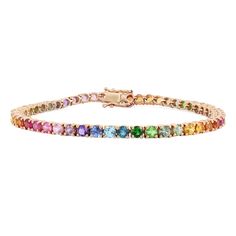 Get lost in a kaleidoscope of color with this rainbow tennis bracelet. An assortment of vibrant 3.0mm stones sit in four prong settings along the slim 14K gold backing, making this a dreamy 6.78Ct tennis bracelet. Multicolor Fine Jewelry Tennis Bracelet With Jubilee Style, Fine Jewelry Multicolor Tennis Bracelet With Jubilee Style, Multicolor Gemstone Tennis Bracelet, Multicolor Multi-stone Round Tennis Bracelet, Gold Band Bracelet, Gold Sunset, Tennis Jewelry, Pretty Jewelry Necklaces, Bracelet Tennis