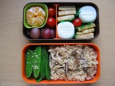 two plastic containers filled with food on top of a table