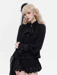 Add a touch of dark elegance to your wardrobe with this gothic black shirt featuring a charming spider charm decorated bowtie. The long sleeves with button cuffs and flounce create a striking and unique look that is perfect for any occasion.   	 		 			Size 			S 			M 			L 			XL 		 		 			Full Length 			54 			55 			56 			57 		 		 			Bust 			92 			96 			100 			104 		 		 			Shoulders 			36 			37 			38 			39 		 		 			Neck 			40 			41 			42 			43 Long Sleeve Halloween Party Blouse, Long Sleeve Blouse For Halloween Party, Halloween Party Long Sleeve Blouse, Black Gothic Blouse For Alternative Fashion, Gothic Long Sleeve Blouse For Fall, Black Gothic Blouse For Formal Occasions, Gothic Party Tops With Buttons, Black Gothic Blouse For Fall, Gothic Formal Tops For Fall