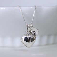 Personalized Heart Locket Necklace Sterling by alexandreasjewels Personalized Silver Heart Necklace In Cute Style, Silver Personalized Cute Heart Necklace, Cute Personalized Silver Heart Necklace, Heart Locket Necklace For Valentine's Day, Valentine's Day Heart Locket Necklace With Charm, Cute Silver Charm Necklace For Valentine's Day, Cute Silver Charm Necklace With Heart Charm, Adjustable Heart Cut Necklace With Heart Charm, Valentine's Day Heart Cut Locket Necklace With Heart Charm