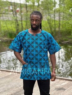 This beautiful dashiki dress / shirt can be worn by both men and women. It may be paired with jeans, leggings or a waist belt to make it more defined. For some, it can also be worn as a mini dress. This dress / shirt is perfect for any occasion. This shirt should traditionally be worn oversized. Short Sleeve Shirt Made of 100% Cotton 2 Front pockets Handwash recommended if possible or machine wash inside out at maximum 40 degrees celcius. (Please note: Every dashiki shirt is unique, because they Fitted Blue Casual Tunic, Casual Fitted Blue Tunic, Fitted Casual Blue Tunic, Printed Short Sleeve Tunic For Festivals, Short Sleeve Printed Tunic For Festival, Casual Short Sleeve Tunic For Festival, Blue Casual Short Sleeve Tunic, Blue Short Sleeve Casual Tunic, Casual Blue Short Sleeve Tunic