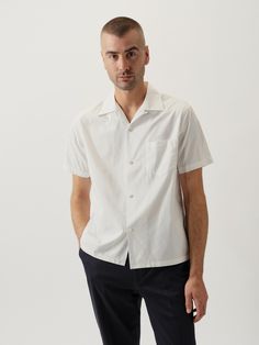 A classic midcentury style in lightweight mercerized cotton, washed for a broken-in yet structured feel. | Buck Mason Men's Wornwell S/S Camp Shirt in White, Size Large | Cotton Classic Shirt With Welt Pockets And Camp Collar, Classic Collared Short Sleeve Unstructured Shirt, Classic Collared Short Sleeve Shirt, Classic Cotton Camp Shirt With Camp Collar, Classic Camp Shirt With Johnny Collar Relaxed Fit, Classic Relaxed Fit Camp Shirt With Johnny Collar, Classic Johnny Collar Camp Shirt With Relaxed Fit, Classic Collared Camp Shirt With Welt Pockets, Classic Cotton Short Sleeve Shirt With Johnny Collar