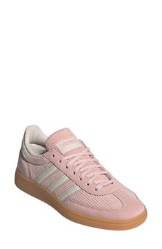 A low profile maintains the range-of-motion comfort of a handball shoe reborn as a sneaker that pairs an upper of soft corduroy with a classic gum-rubber sole. Lace-up style Removable insole Leather and textile upper/textile lining/rubber sole Imported Adidas Handball Spezial, Adidas Handball, Flat Slipper, Room Fragrances, Pink Adidas, Sports Accessories, Eyewear Accessories, Sweaters Knitwear, Wash Bags