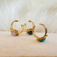 Bring some mystical vibes to your style with Earth Spirit Gem Rings! With their boho retro look, they'll add a little something special to any outfit. 🤩 And just look at those magical gems—they'll keep your spirit grounded, no matter how high your style game goes! 🤩✨ Each ring is adjustable, ensuring a perfect fit no matter the size of your finger. Slip one on and accessorize your look with a touch of classic, bohemian chic! 🥰 ✓ Material: Stainless Steel✓ Gemstone: turquoise, rose quartz, gre Adjustable Mystical Moonstone Ring With Natural Stones, Adjustable Mystical Gemstone Jewelry, Adjustable Round Magical Jewelry, Bohemian Adjustable Stackable Moonstone Ring, Adjustable Stackable Bohemian Moonstone Ring, Bohemian Brass Stackable Jewelry, Adjustable Magical Gemstone Rings, Adjustable Gold Ring With Magical Style, Adjustable Crystal Ring With Gemstone Accents