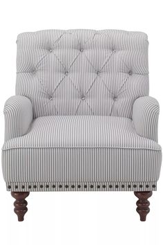 a gray and white striped chair with wooden legs