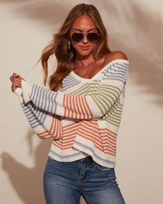 Wrap yourself in effortless style with the Yara Striped Oversized Pullover Sweater. This chic gem features a plush soft knit fabric that feels like a cozy hug, while the bold stripes add a touch of playful sophistication. The oversized fit is perfect for layering or lounging, bringing a relaxed elegance to your everyday look. Whether you're heading to brunch or snuggling up with a book, the Yara Sweater blends comfort with chic, making it a must-have for a laid-back, elevated wardrobe. V-necklin Beachy Sweaters, Elevated Wardrobe, Relaxed Elegance, Back To School Fits, Bold Stripes, School Fits, Oversized Pullover, Beautiful Clothes, Cute Fits