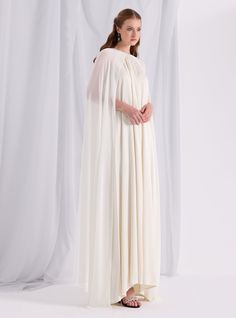 WF ATELIER Model height: 177 CM 100% Polyester Length: 145 cm Pre-draped Maxi Dress With Cape Sleeves For Wedding, White Pre-draped Dress With Draped Sleeves, White Dresses With Cape Sleeves, Pre-draped Long Sleeve Wedding Dress, White Cape Dress For Spring, Silk Cape Dress With Draped Sleeves, Spring Cape Dress In White, Spring Cape Dress With Draped Sleeves, Spring Dresses With Draped Sleeves And Cape