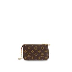 M58009 Mini Pochette Accessoires By Louis Vuitton The Mini Pochette Accessoires In Monogram Canvas Is A Stylish Way To Carry Essentials. Its Secure Zip Protects A Spacious Compartment, While The Chain And Hook Enable It To Be Attached To A Larger Bag, As Well As Carried In The Hand. The Rounded Shape And Supple Canvas Give This Pouch A Particularly Pleasant Feel. 5.5 X 3.5 X 0.8 Inches (Length X Height X Width) Monogram Coated Canvas Natural Cowhide-Leather Trim Textile Lining Gold-Color Hardwar Louis Vuitton Mini Pochette, Pochette Louis Vuitton, Louis Vuitton Official Website, Louis Vuitton Neverfull Mm, Louis Vuitton Pochette, Vintage Louis Vuitton, Large Bag, Small Leather Goods, Monogram Canvas