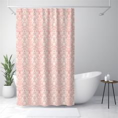 a bathroom with a bathtub, toilet and shower curtain in pink colors on the wall