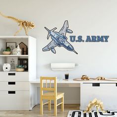 a child's bedroom with a wall decal that says u s army