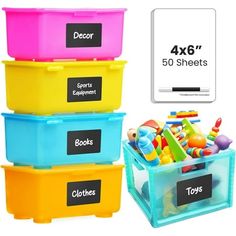 four plastic storage containers with labels on them and toys in the bins next to each other