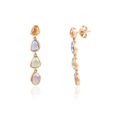 These gorgeous Multi Sapphire Drop Earrings are perfect for a romantic evening with a lover. These earrings are boldly colorful and feminine.  -Material - 18K Solid Rose Gold -Gemstone - Multi Sapphires -Gemstone weight - 4.660 ct -Gross weight - 4.15 grams Surprisingly, blue sapphire also has some health benefits. Wearing the Neelam/Blue Sapphire aids in digestion too. It also helps prevent several stomach-related ailments in the individuals. Blue sapphire blesses the wearer with name, fame, fo Elegant Teardrop Multi-stone Earrings, Modern Multi-stone Yellow Gold Earrings, Modern Yellow Gold Multi-stone Earrings, Multi-stone Drop Earrings For Evening, Evening Multi-stone Drop Earrings, Elegant Multi-stone Earrings For Party, Elegant Yellow Gold Multi-stone Earrings, Elegant Multi-stone Teardrop Earrings, Elegant Multi-stone Briolette Earrings