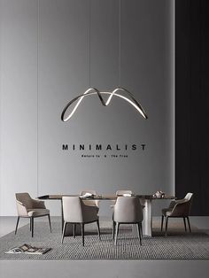 the minimalist logo is displayed above a dining room table with chairs and a rug