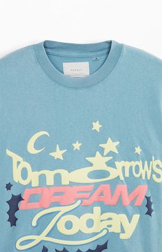 The Tomorrow's Dream Oversized T-Shirt from PacSun offers a blend of comfort and statement style. Featuring a crew neckline, short sleeves, and a standard fit, this tee is adorned with puff graphics printed on the front, adding a bold touch to your look.


	Crew neckline
	Short sleeves
	Standard fit
	Front graphic
	Machine washable Oversized Blue T-shirt With Slogan, Blue T-shirt With Slogan In Relaxed Fit, Oversized T Shirt, Oversized Tshirt, Exclusive Collection, Pacsun, Crew Neckline, Jeans Pants, Cool Style