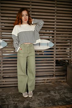 If you think your soulmate might be avocado toast, then these are the wide-leg pants for you. Our Avocado Queen Pants are made from stretch, loose-fit organic cotton denim in a fun, sage green color. Pants feature a classic, deep pocket construction, zip-fly closure, high-rise waist with wide, relaxed legs. Fun square front and back pockets Raw-edge hem On-trend, subtle sage green color Models are 5’6 and wearing a size small 98% organic cotton / 2% spandex *P.S. Models are wearing our Back Toge Green Wide-leg Jeans For Spring, Khaki Cotton Wide Leg Pants For Fall, Fall Khaki Cotton Wide Leg Pants, Trendy Olive Cotton Bottoms, Green Relaxed Fit High-waisted Jeans, Trendy Green Wide Leg Pants With Relaxed Fit, Trendy Green Relaxed Fit Wide Leg Pants, Green Relaxed Fit Wide-leg Cargo Pants, Trendy Khaki Wide Leg Cotton Pants