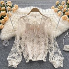 Long Sleeve Lace Top For Spring, Casual Long Sleeve Lace Top With Lace Collar, Long Sleeve Lace Top For Fall, Casual Long Sleeve Lace Top, Long Sleeve Lace Tops With Lace Sleeves, White Long Sleeve Lace Top With Patchwork, White Long Sleeve Lace Patchwork Top, Casual Long Sleeve Lace Blouse, Feminine Long Sleeve Crochet Lace Top