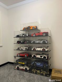 a display case filled with lots of toy cars