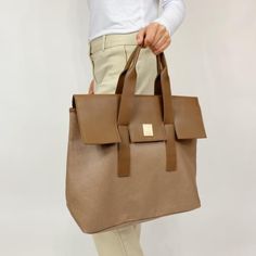 New Without Tags Spacious Tote Bag Measurements: Height 13.5" Width 18" Fiber Content: 100% Pvc Everyday Light Brown Large Capacity Satchel, Versatile Light Brown Everyday Bag, Light Brown Rectangular Bag For Everyday Use, Everyday Neutral Satchel Bag, Neutral Everyday Satchel Bag, Light Brown Rectangular Bag For Everyday, Everyday Light Brown Rectangular Bag, Light Brown Rectangular Everyday Bag, Taupe Bags With Leather Handles For Daily Use