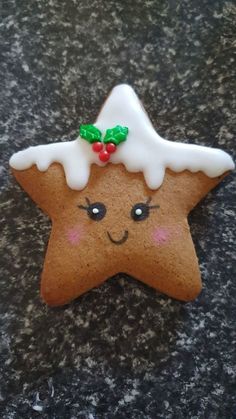 a star shaped cookie with icing on it