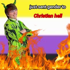 a man dressed up as a demon standing in front of fire with the caption just sent gender to christian hell