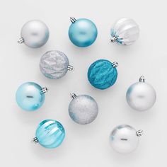 blue and white christmas ornaments arranged in a circle