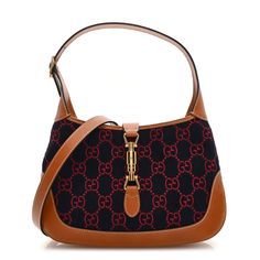 This is an authentic GUCCI Monogram Felt Azalea Calfskin Web Small Jackie 1961 Hobo in Navy and Burgundy. This Gucci hobo is beautifully crafted of felt in navy and burgundy Gucci GG monogram. The bag features leather trim including the adjustable looping shoulder strap, base, corners, and crossover strap. This secures with a light gold piston lock and opens to a beige leather interior with zipper and patch pockets. Soho Disco Bag, Small Messenger Bag, Gg Monogram, Gucci Monogram, Vintage Monogram, Gucci Shoulder Bag, Bag Light, Chain Bags, Leather Interior